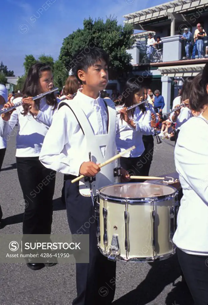 mixed ethnic gender high school students marching band