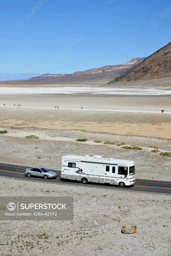 motorhome passing people at Badwater in Death Valley National Park California
