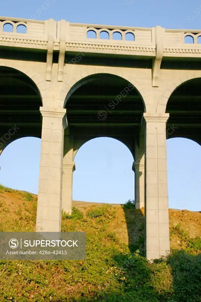 Arched supports Patterson Memorial Bridge highway 101 over Rogue River on coast at Gold Beach Oregon