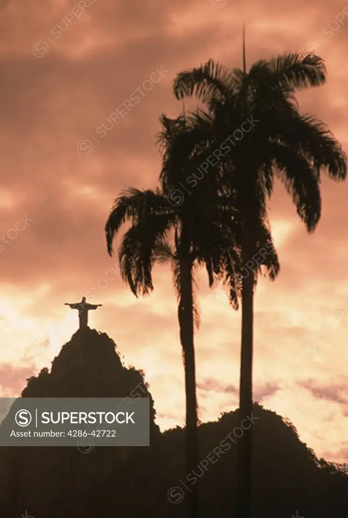 Distant view of Christ the Redeemer statue at Corcovado on Sugarloaf Mountain in Rio de Janeiro, Brazil. 