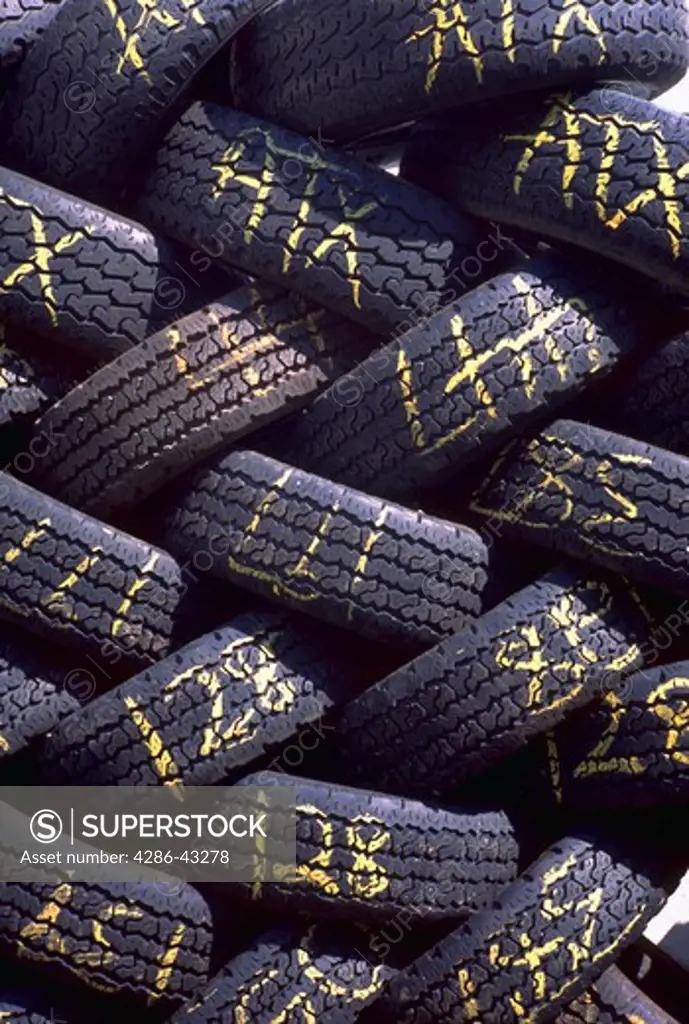 Close-up of a pile of recalled automobile tires.