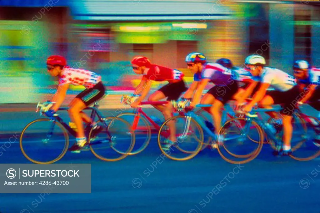 Bicycle racers, blurred.