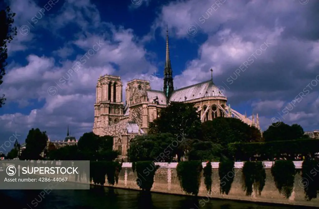 WATERFRONT VIEW OF THE CATHEDRAL OF NOTRE DAME PARIS FRANCE