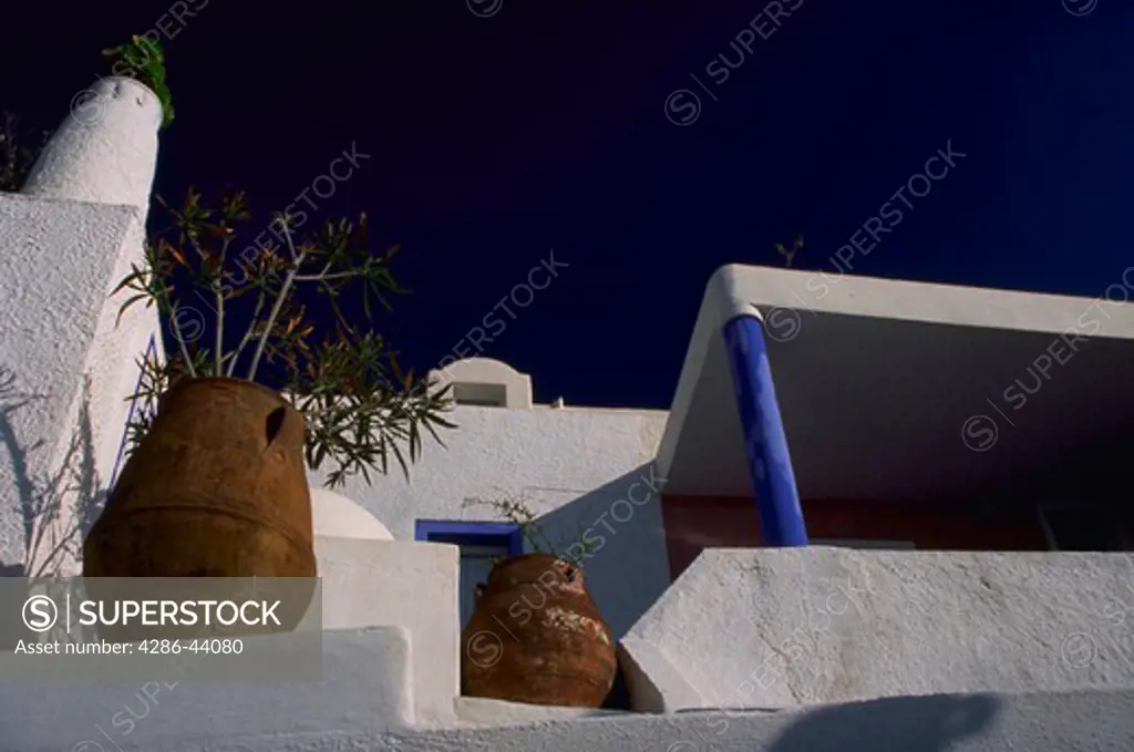 SANTORINI GREEK HOME WITH CLAY URNS