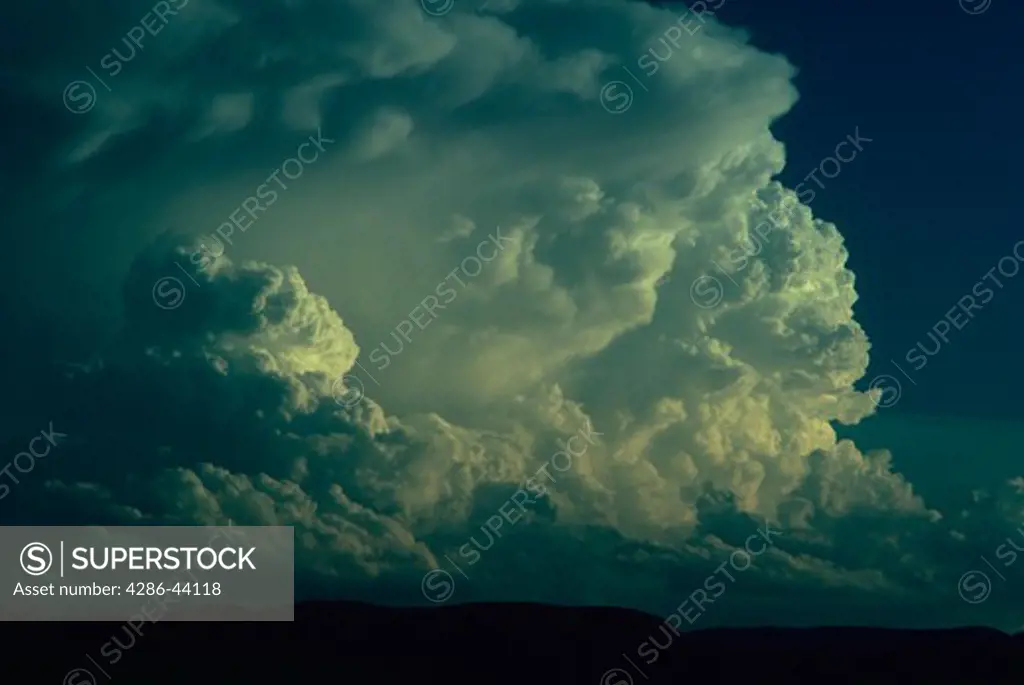  Thunderheads boil up to thousands of feet over the Black Hills of South Dakota.
