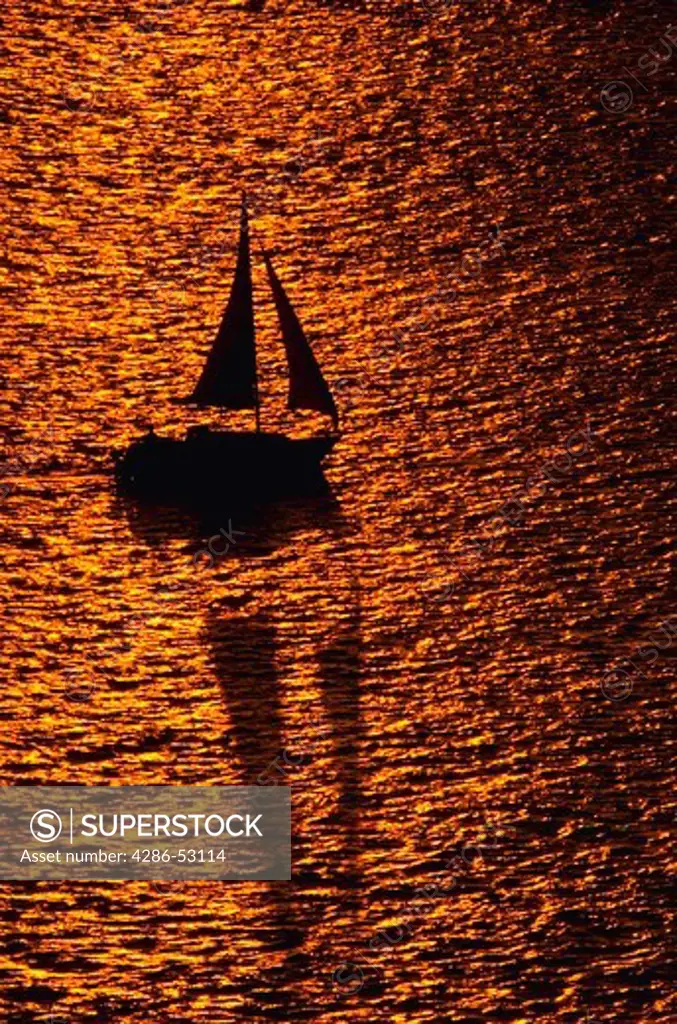 Silhouette of sailbaot at sunset, Florida Gulfcoast.