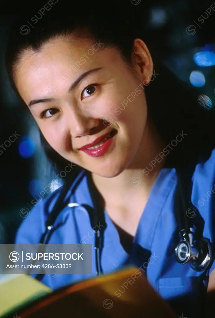 Portrait of female Asian doctor.
