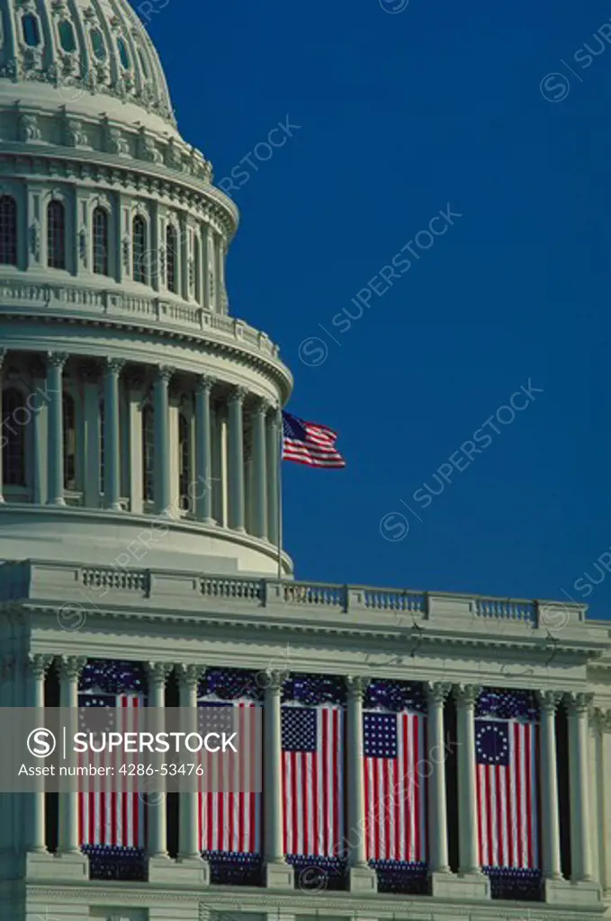 U.S. Capitol displays the variations of the American flag in historical sequence on Presidential Inaugural Day.