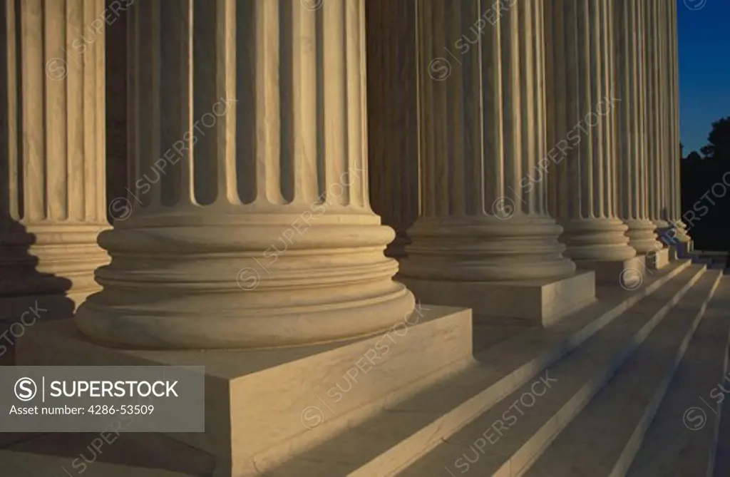 Close-up of the base of the columns of the U.S. Supreme Court building, Washington, DC.