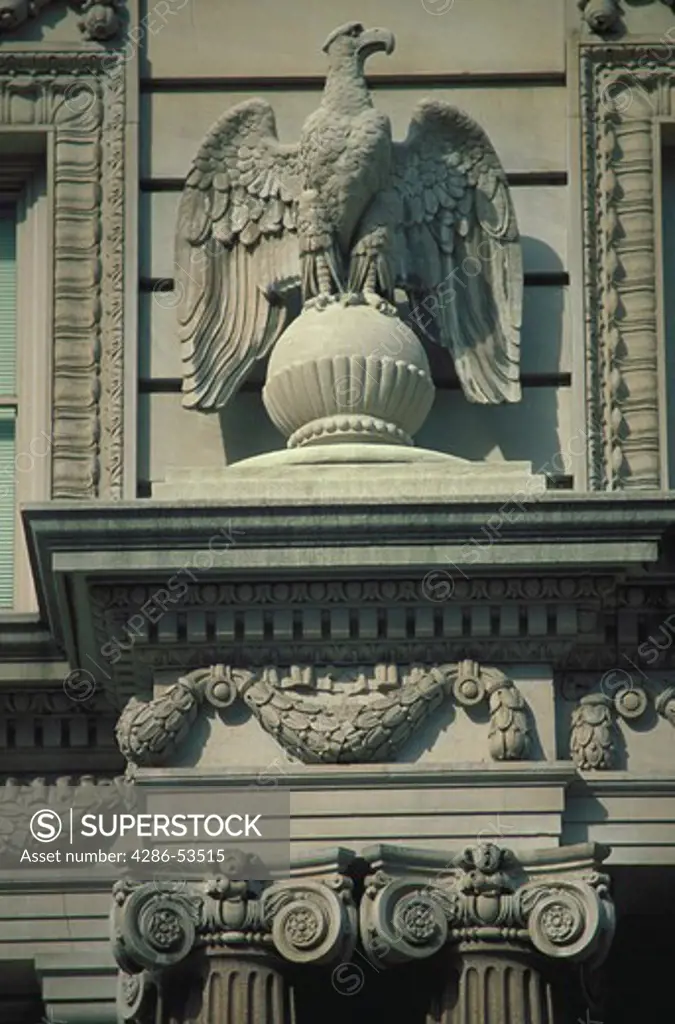 Close-up of decorative adornments on exterior of building in Washington, DC.