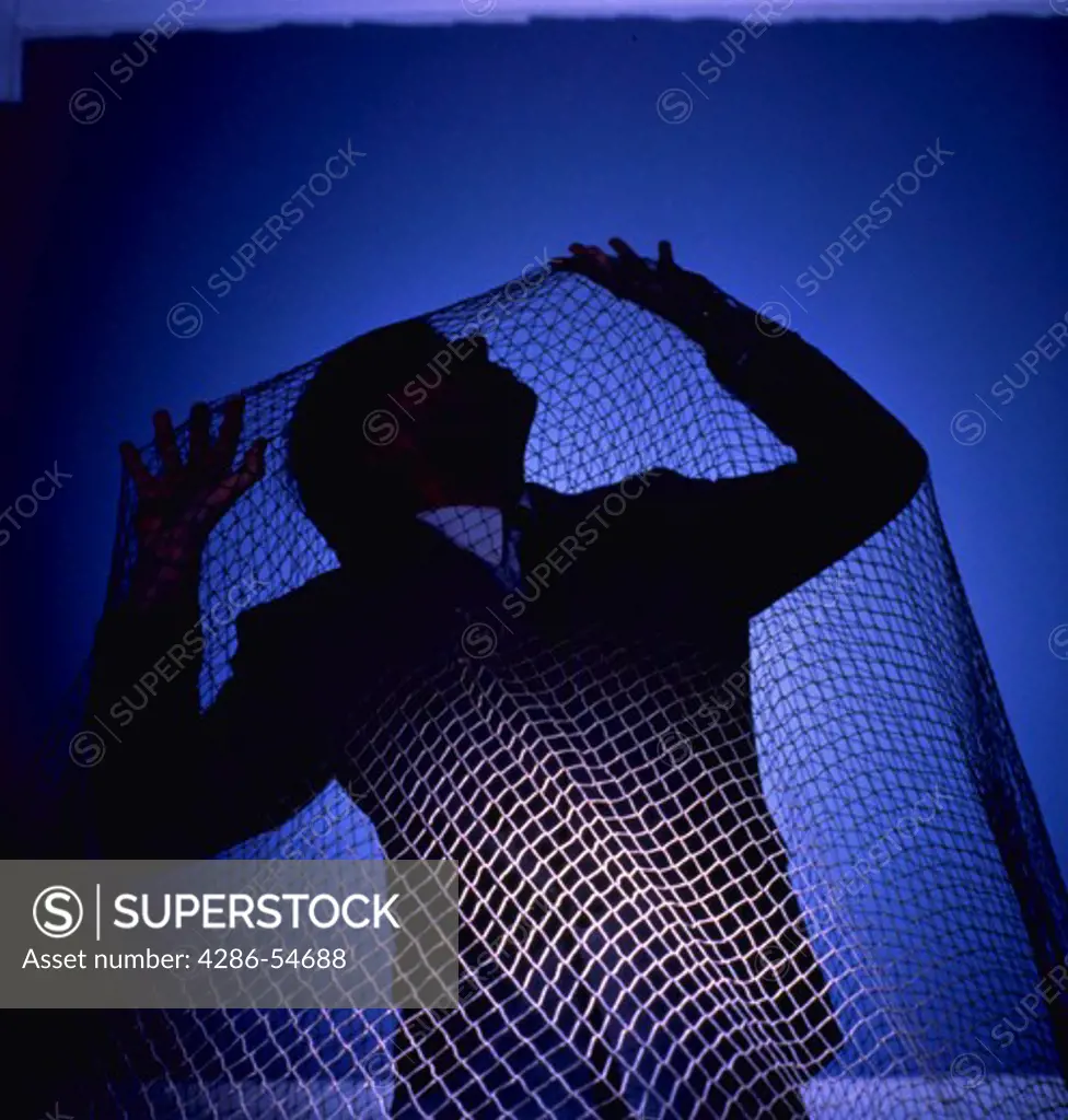 Man trapped in net