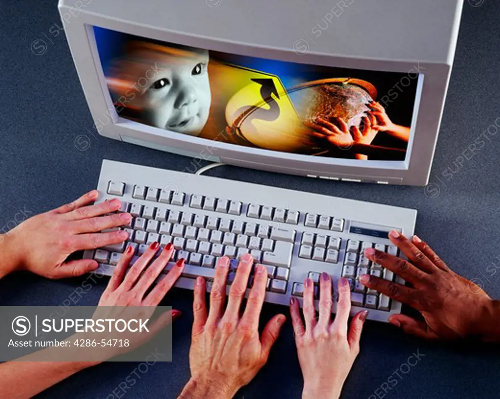 Several hands on computer keyboard with montage of images on monitor.