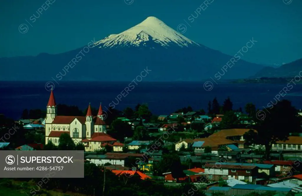 Snow-capped Osorno volcano, 2652 meters, rises above Lake Llanquihue and the town of Puerto Varas in Chile's famed Lake District.