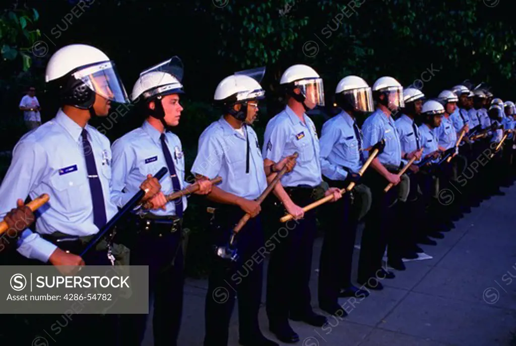 Riot control police in formation during the aftermath of the Mount Pleasant disturbances in Washington, DC.