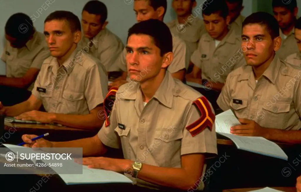 Venezuelan National Guard cadets at their desks in a classroom at the National Guard Academy in Cordero, Tachira State, in the Venezuelan Andes.