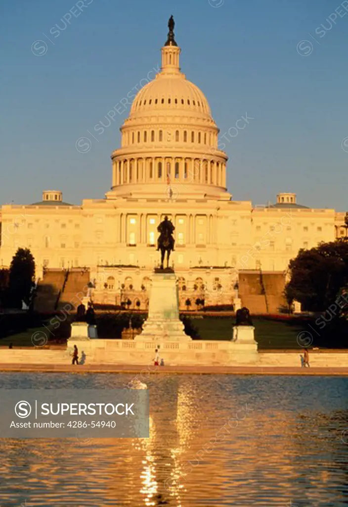 United States Capitol and Reflecting Pool, late afternoon, Washington, DC.
