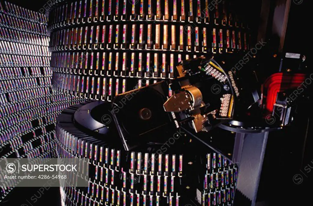 A robotic arm retrieves MCI Corporation customer telephone call records on cassette tape, in a tape silo at MCIs Perryman Data Center in Aberdeen, Maryland.