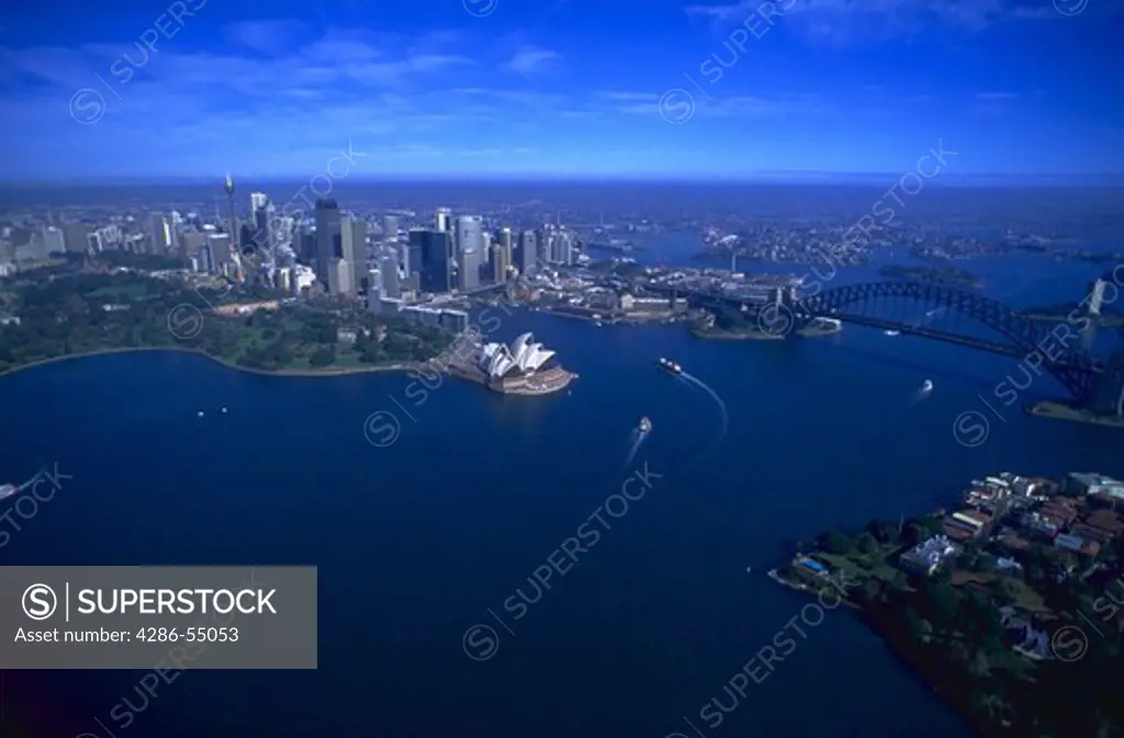 Aerial view of Sydney Opera House, the harbor and the downtown Sydney skyline, Sydney, Australia. Sydney is the site of the 2000 Olympic Games.