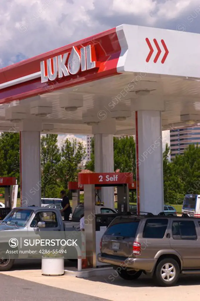 McLEAN, VIRGINIA, USA - Customers purchase gas at Russian-owned LUKOIL service station, Tysons Corner.