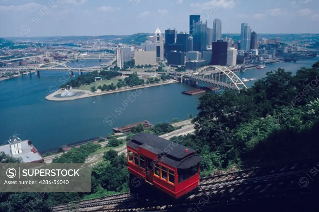 View of downtown Pittsburgh, PA and the meeting of the Allegheny and Monongahela Rivers to form the Ohio River.
