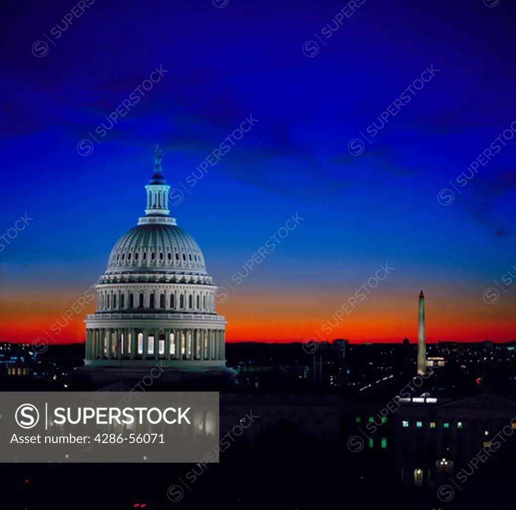 View of the Capitol dome and the Washington, DC skyline at night.