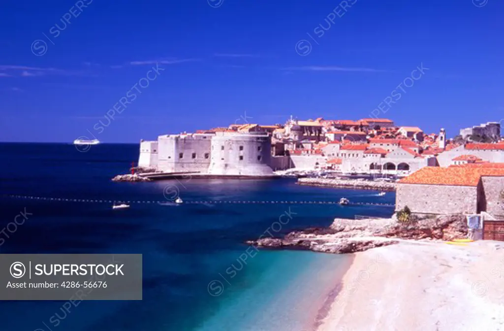 Croatia. Dubrovnik. View of the Old City, Harbor and Ploce beach. Cruise ship in the background. 