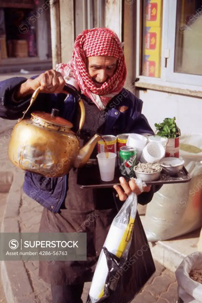 Old Jordanian Man selling Mint Tea. Amman, Jordan, The Middle East.
