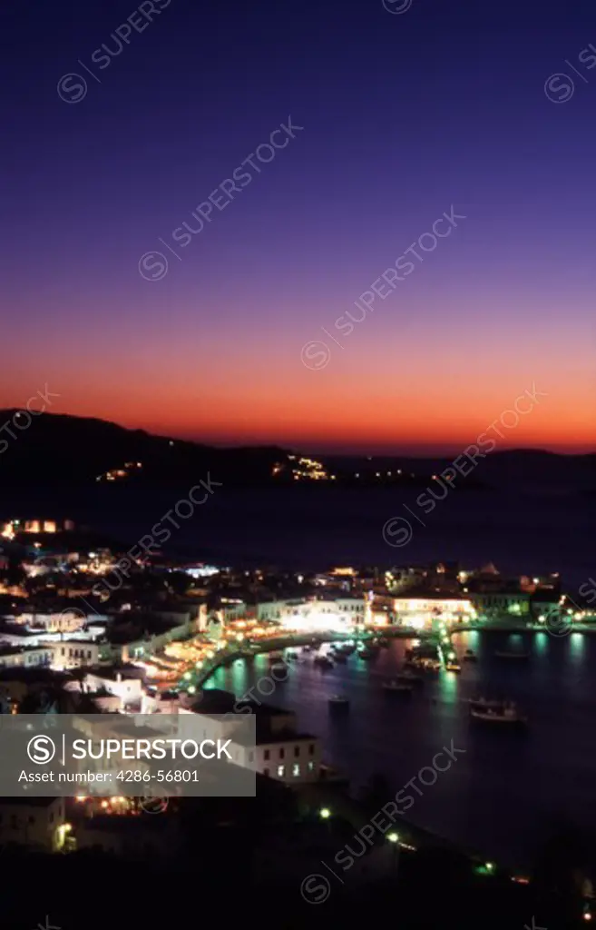 Greece. Cyclades Islands. Mykonos Town Harbor at Dusk.