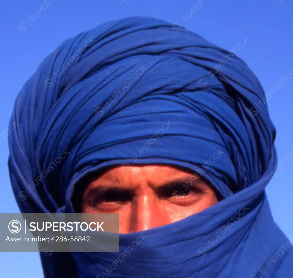 Portrait of a Tunisian Berber Tribesman Camel Rider at the Douz Festival. Tunisia.