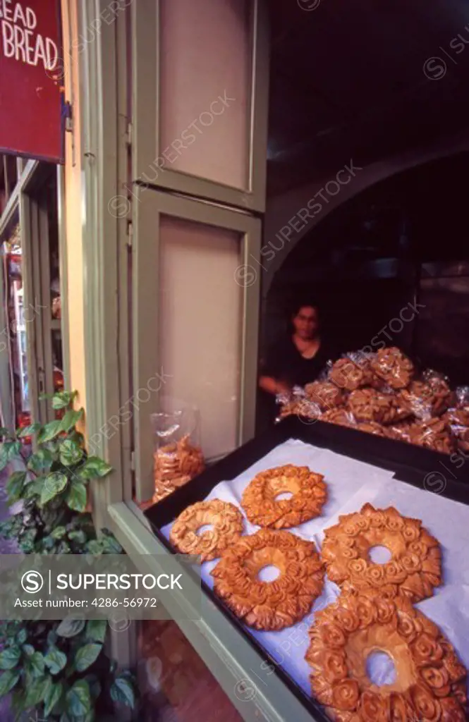 Decorative Wedding Bread baked in the shape of flowered wreaths on display at a bakery. Rethymnon Old Town.  Western Crete. Greece