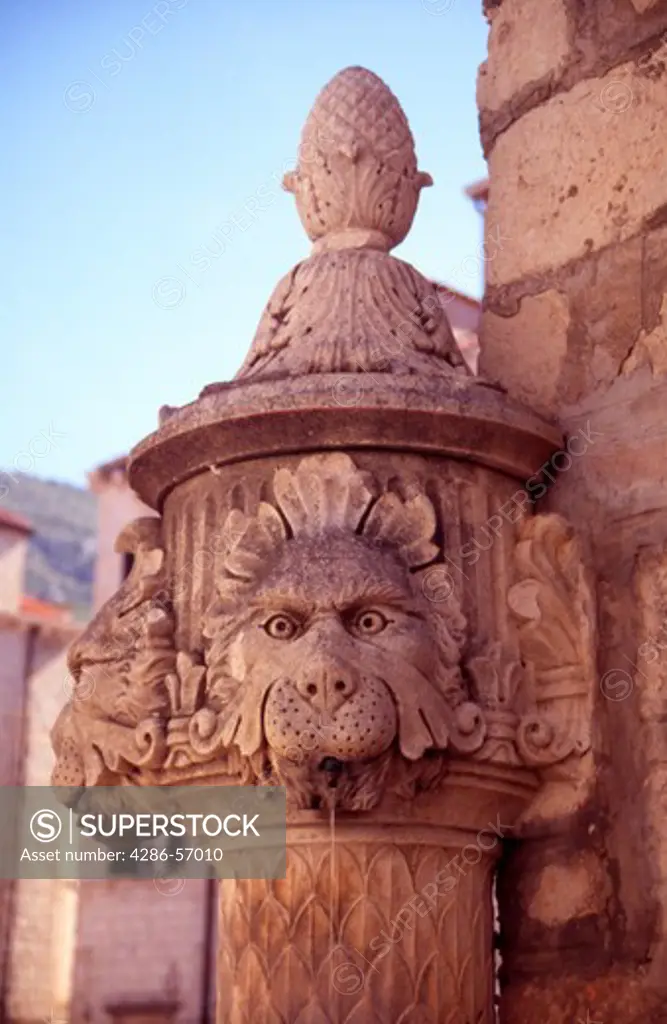 Europe, Croatia, Dubrovnik, Old Town. Lion-faced fountain in the Gunduliceva Poljana square