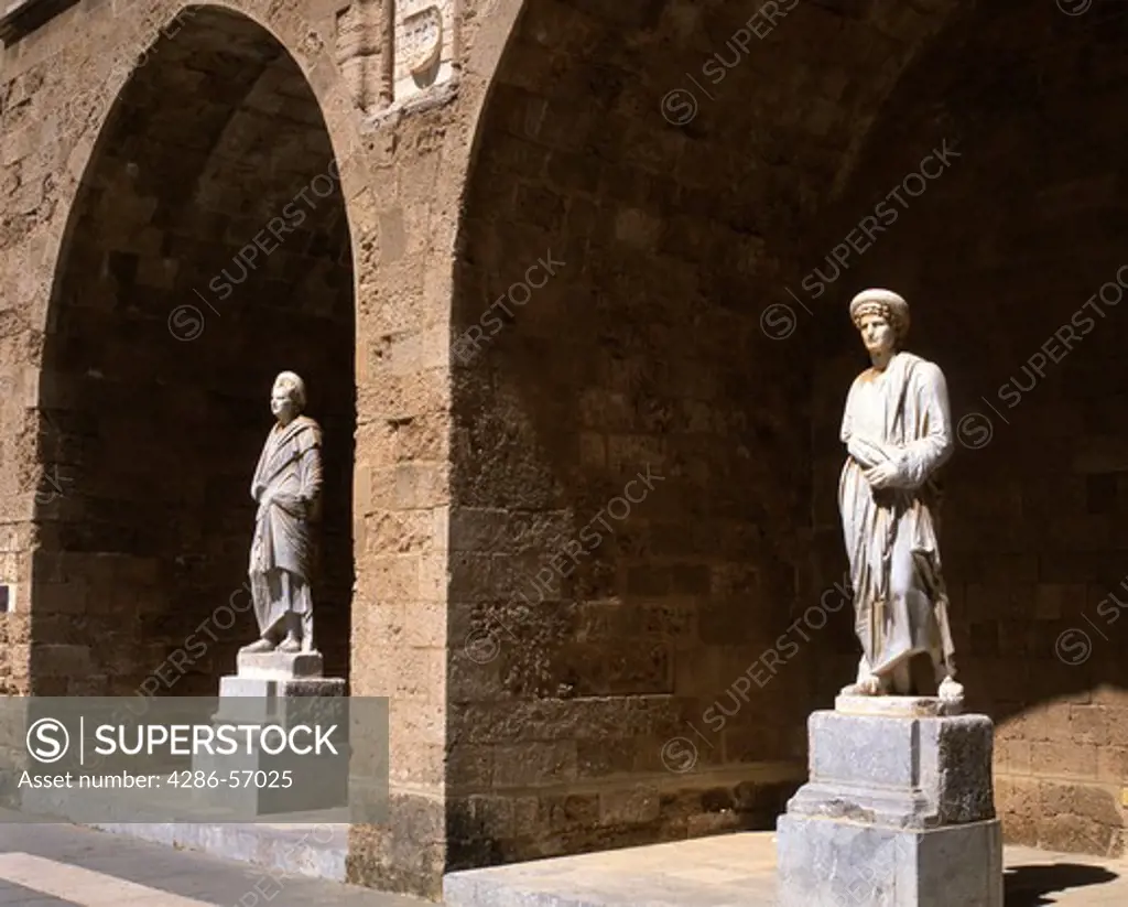 Greece. Dodecanese Islands. Rhodes Old Town. Courtyard inside The Palace of The Grand Masters. Statues from the Hellenistic and Roman Period.