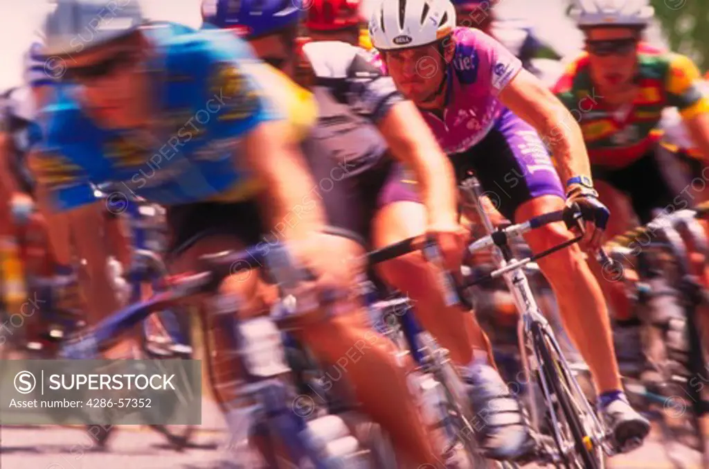 Blurred view of cyclist Bruce Reid competing in the Vuelta de Bisbee bike race in Bisbee, Arizona.