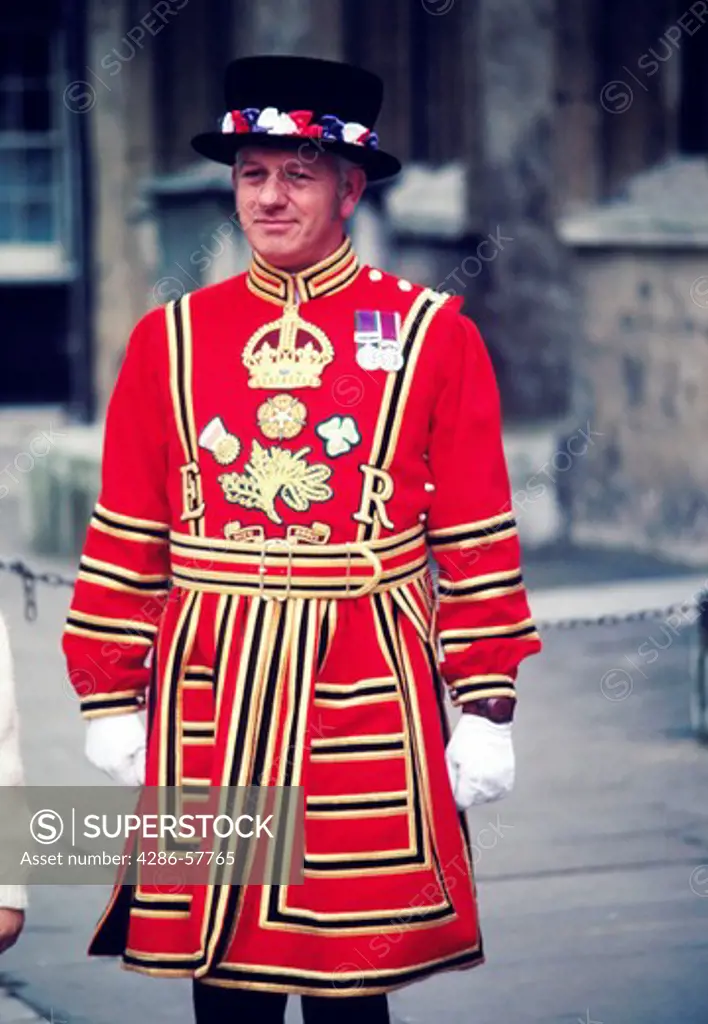 Man dressed in uniform, a beefeater, at the Tower of London, London, England.