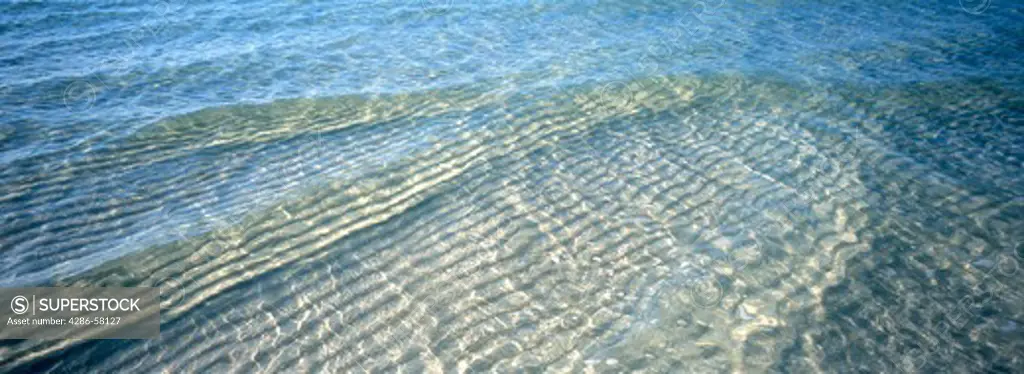 Crystal clear water ripple like molten glass beach side, Bahia Honda State Park, Bahia Honda Key, Florida