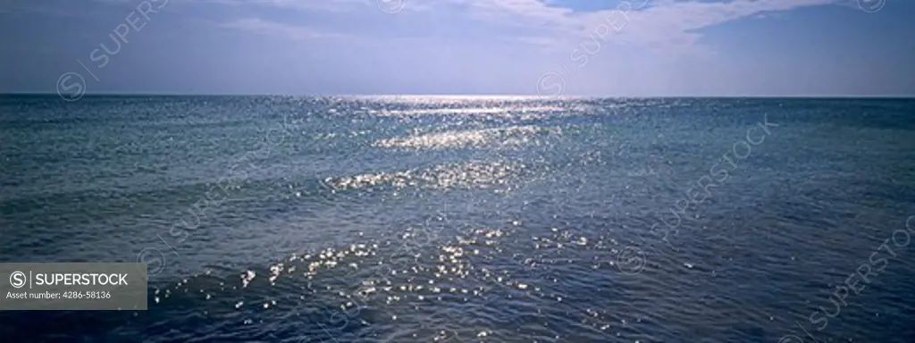 Tranquil ocean ripples reflect noon day sun in the Florida Keys, Bahia Honda State Park, Florida.