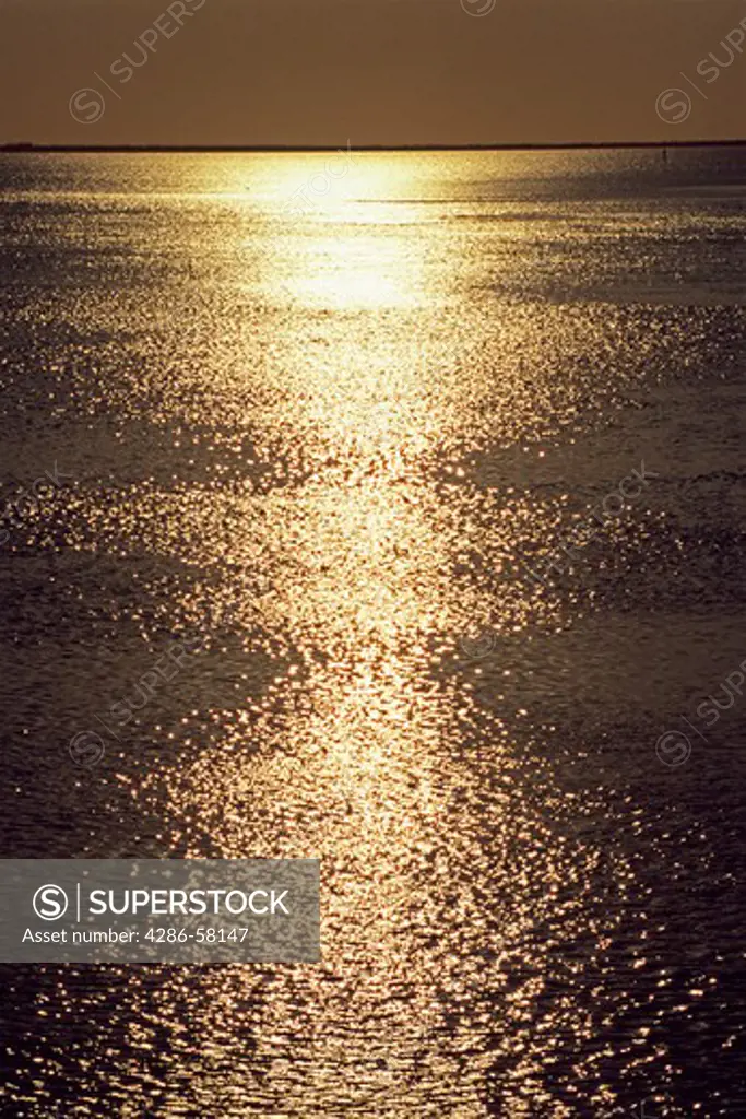 Setting sun shimmers upon endless ocean, Marathon Key, The Florida Keys, Florida