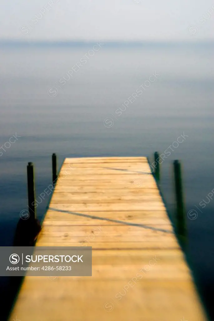 Soft focus lens turns lake and dock into dreamland, Big Pine Lake, Perham, Minnesotta.