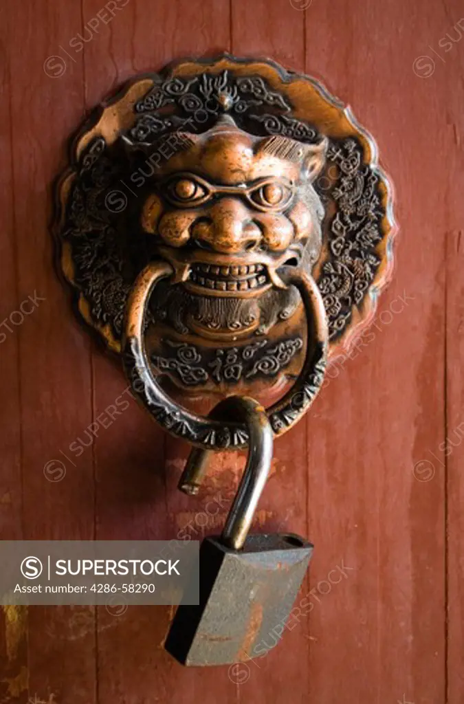 Ornate hardware on wine cellar door, Yunnan Highland Wine Company, Geju, Honghe County, Yunnan Province, China.