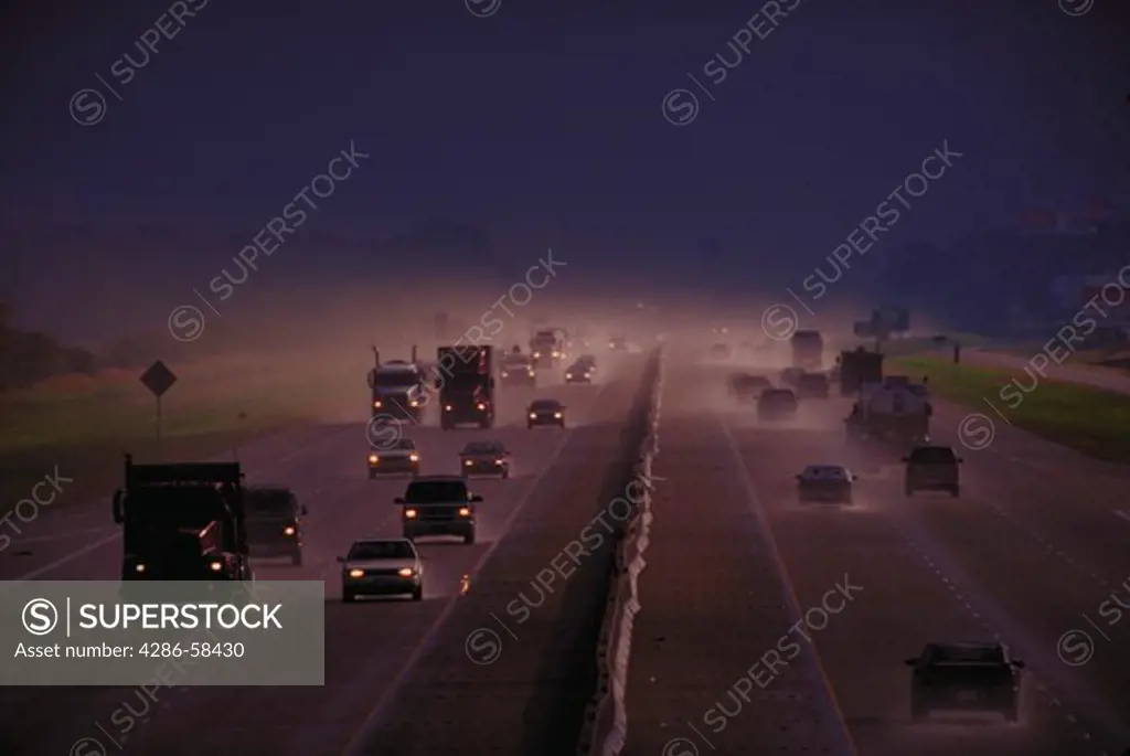 Vehicles on highway during storm, Houston, Texas.