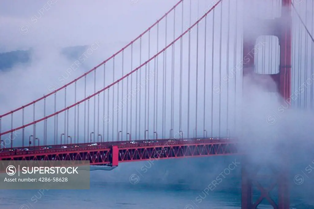 Golden Gate bridge in San Francisco shrouded in fog.