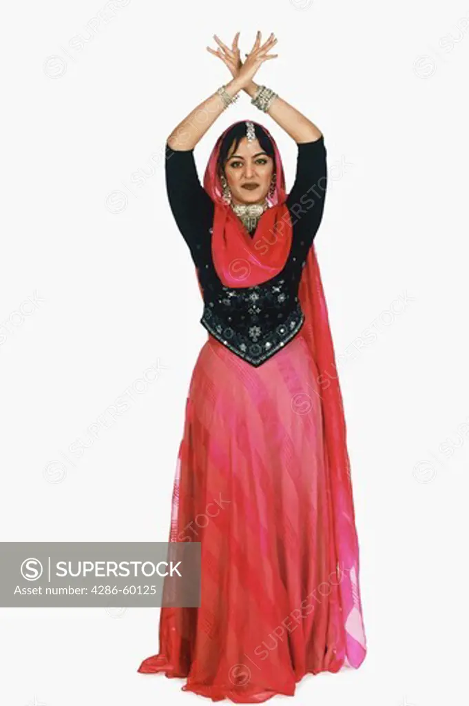 Portrait of a young woman performing folk dance