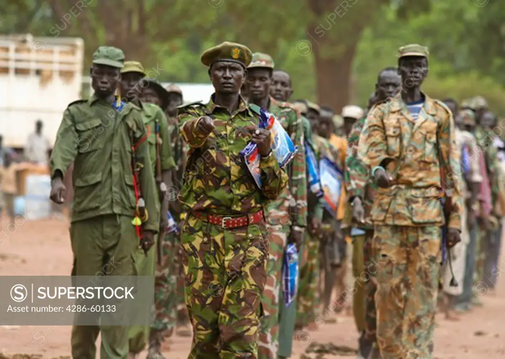 A contingent of the Sudan People's Liberation Army (SPLA) marches with mosquito nets in hand to demonstrate to the public that, 'We defended our country, now we will protect our families from malaria.' The 'Celebrating Today's Conquerors, Nurturing Tomorrow's Heroes' campaign was implemented by the US-based non-profit organization, Population Services International (PSI), in partnership with the South Sudan Ministry of Health.  The leading cause of death among children under five, malaria kills 