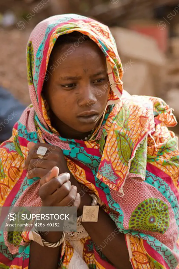 In Ouagadougou, Burkina Faso, Yuma Dicko, a young Fulani woman, prays the afternoon prayer.  More than half the population of this small, landlocked country is Muslim. NOT MODEL RELEASED. EDITORIAL USE ONLY.