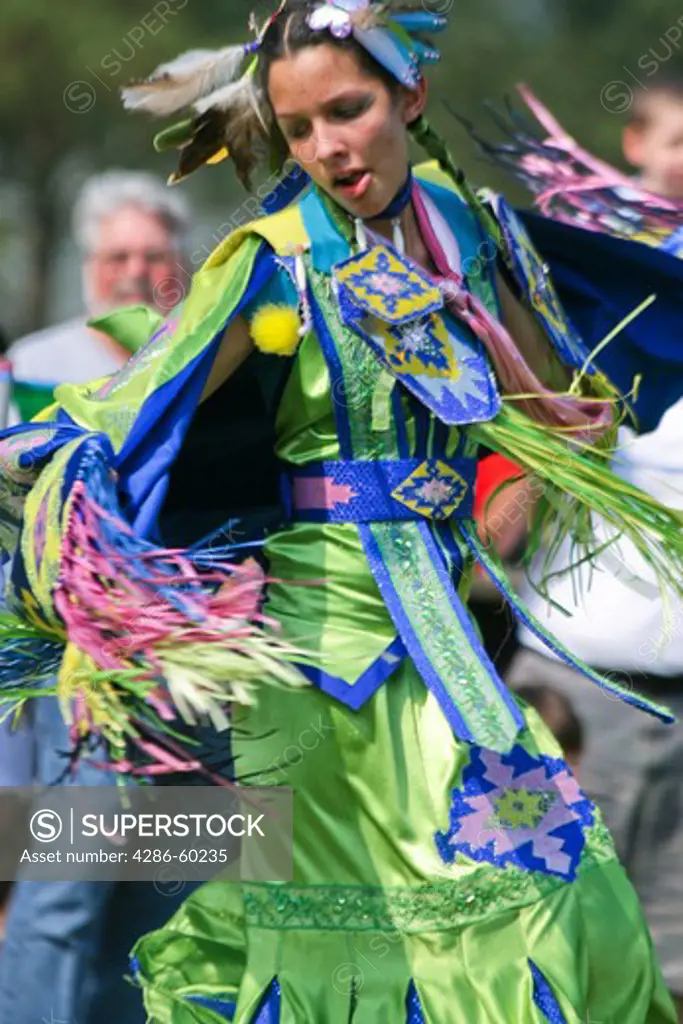 A Native American dancer performs a 'Fancy Dance' at the 8th Annual Red Wing PowWow in Virginia Beach, Virginia. NOT MODEL RELEASED. EDITORIAL USE ONLY.