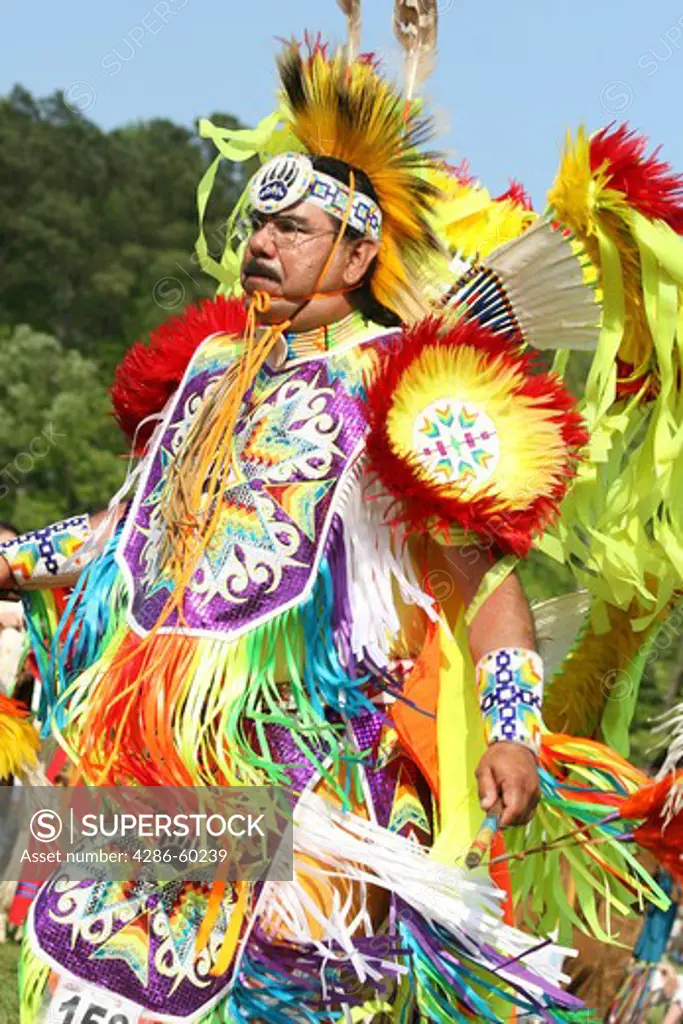 A Native American man dances in full traditional regalia at the 8th Annual Red Wing PowWow in Virginia Beach, Virginia. NOT MODEL RELEASED. EDITORIAL USE ONLY.