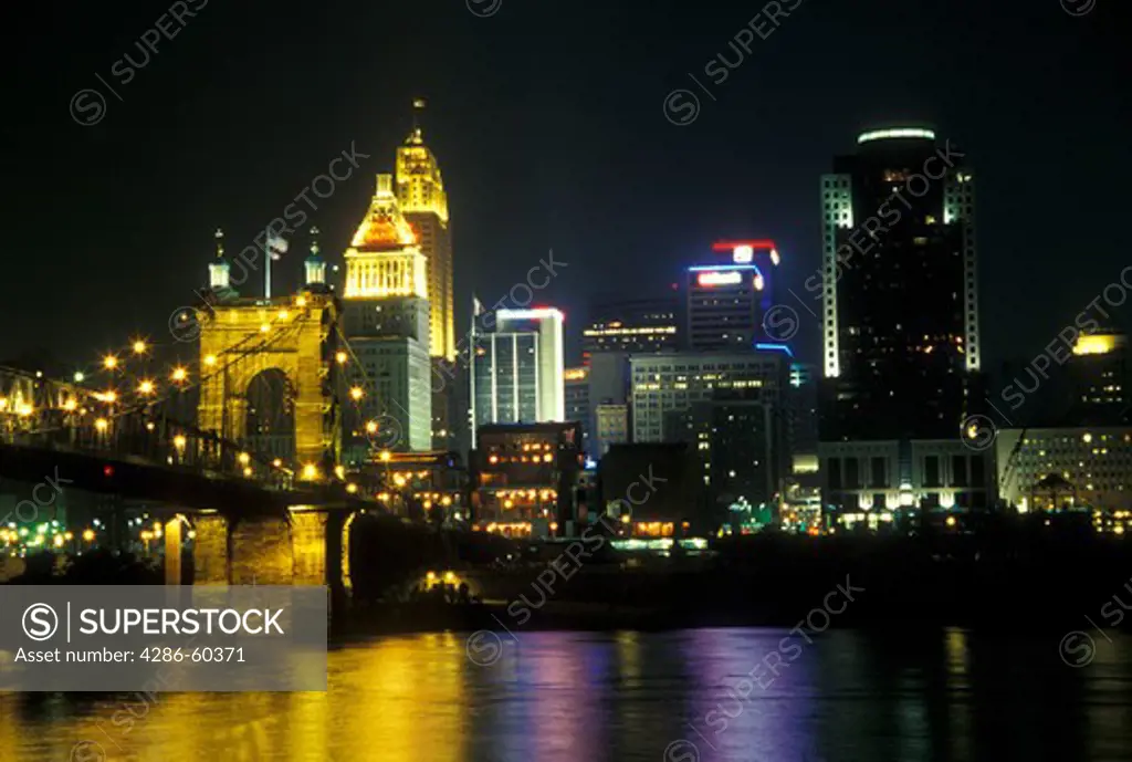 Ohio, Cincinnati, OH, Downtown skyline along the Ohio River, evening