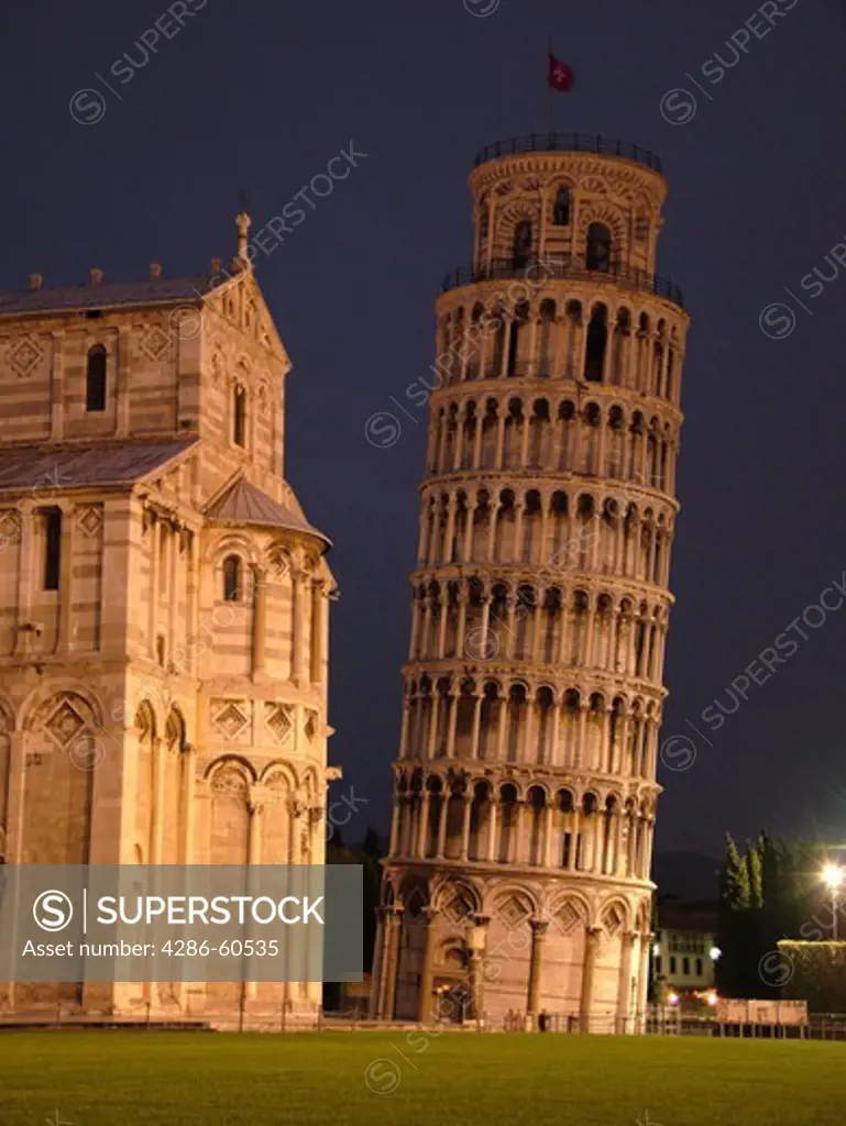 Pisa, Tuscany, Italy, Toscana, Europe, The Cathedral and Leaning Tower (Torre Pendente) in Campo dei Miracoli (Field of Miracles) in the evening in the city of Pisa.