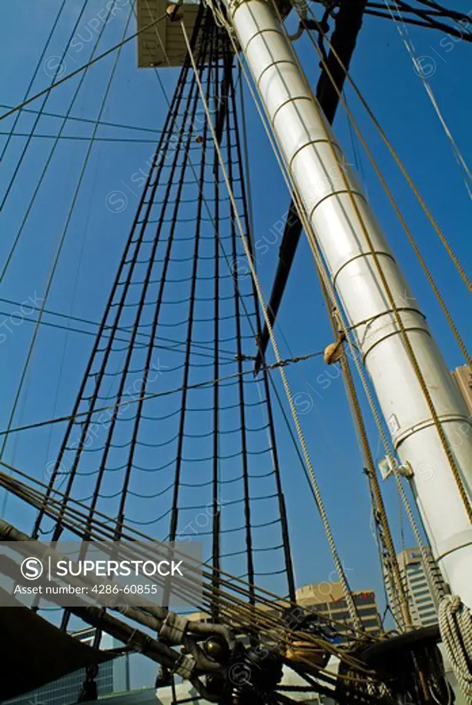 View from below of the  pulleys and lines of a sailboat