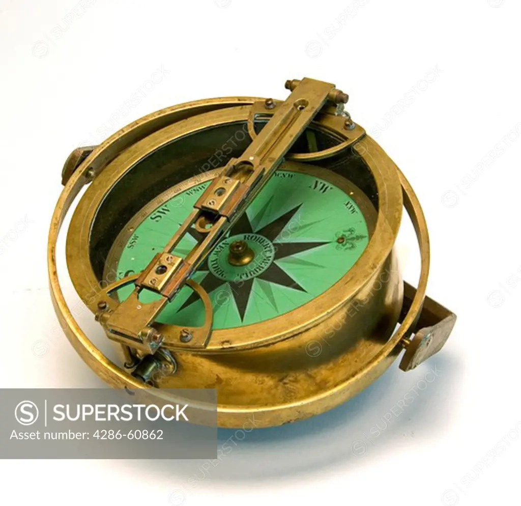Close-up of a an antique compass